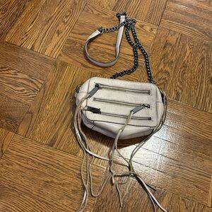 Small tan Rebecca Minkoff chain cross body bag with tassels